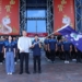 ▲副市長林瑞彥(中)親自授旗嘉義市代表隊，由田徑選手朱婕瑀(右)代表接受。(圖/嘉義市政府提供)